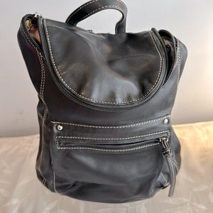 Black leather back pack purse with adjustable straps. See description